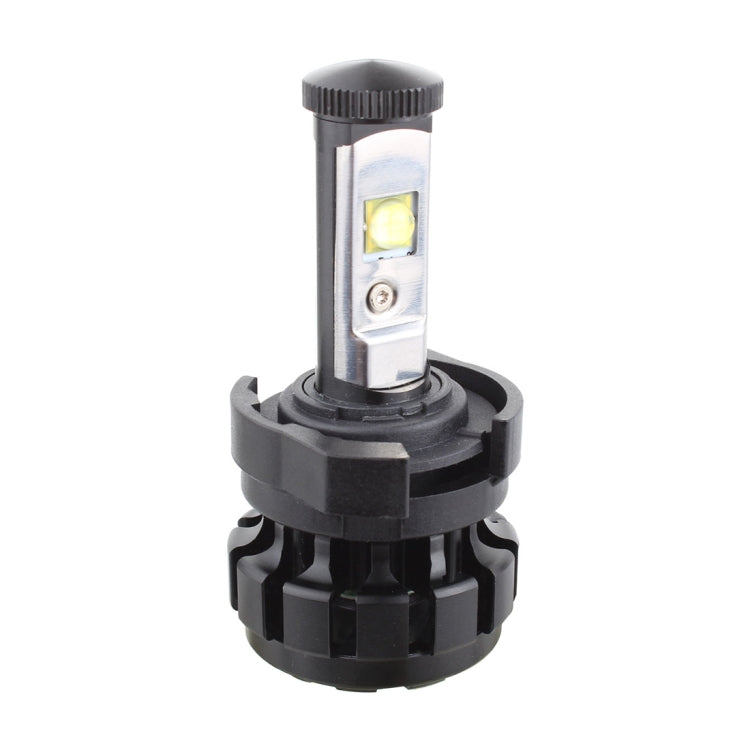 LED headlight bulb retainer adapter holding an H7 bulb with visible LED module