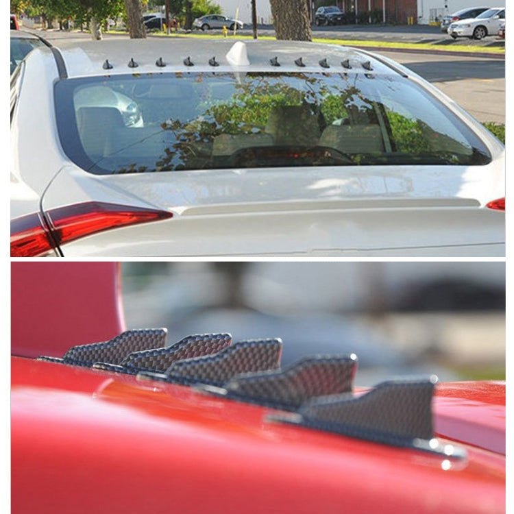 Carbon-fiber look shark fin roof vortex generators installed on car roof