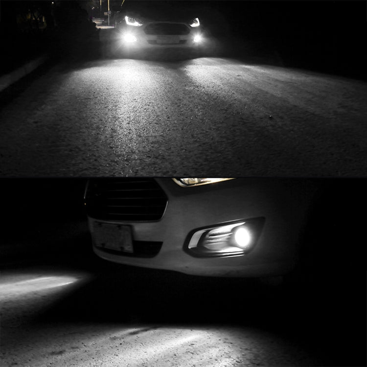 Car fog lamp close-up with bright white LED beam lighting the road