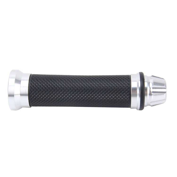 Motorcycle handlebar grip with dark textured rubber and silver ridged end cap