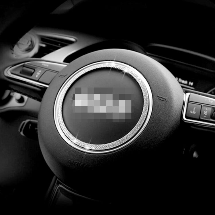 Silver diamond steering wheel decoration ring on steering wheel with controls