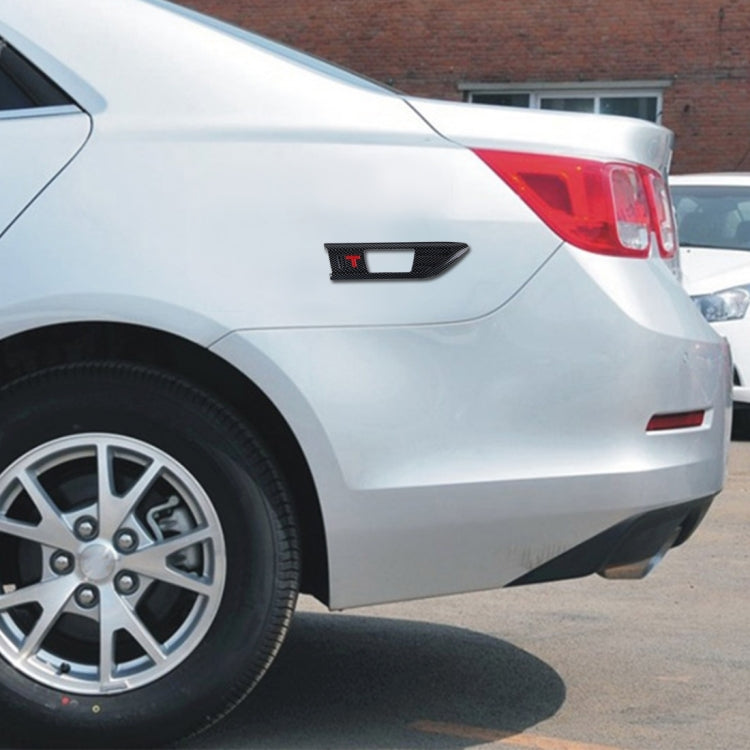 Side air intake vent covers mounted on a car quarter panel, black and chrome finish
