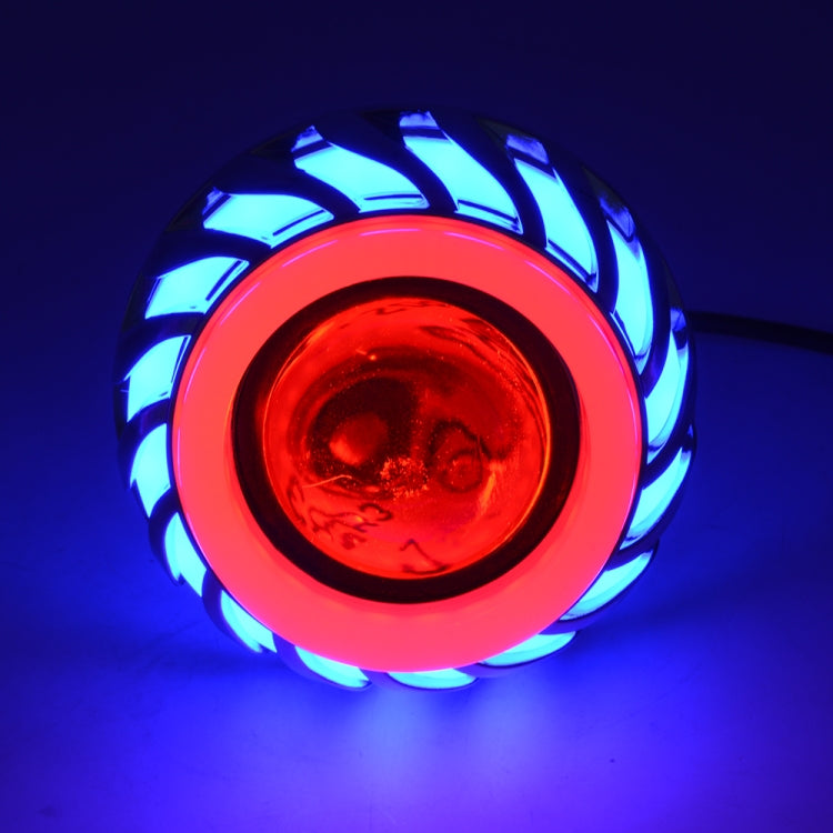 Motorcycle LED headlight lens with red center and blue illuminated outer ring