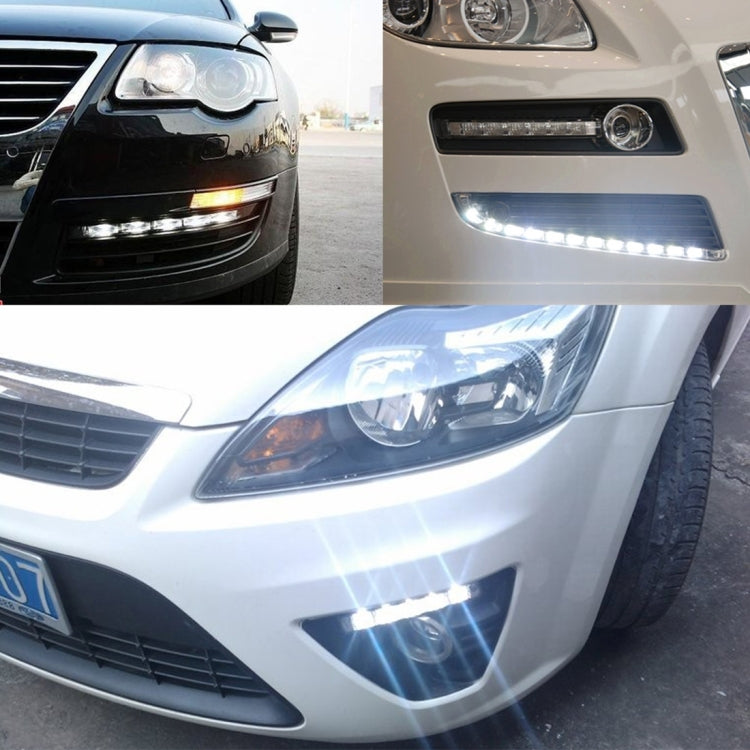 Vehicle headlight area with bright LED daytime running lights along the lower strip