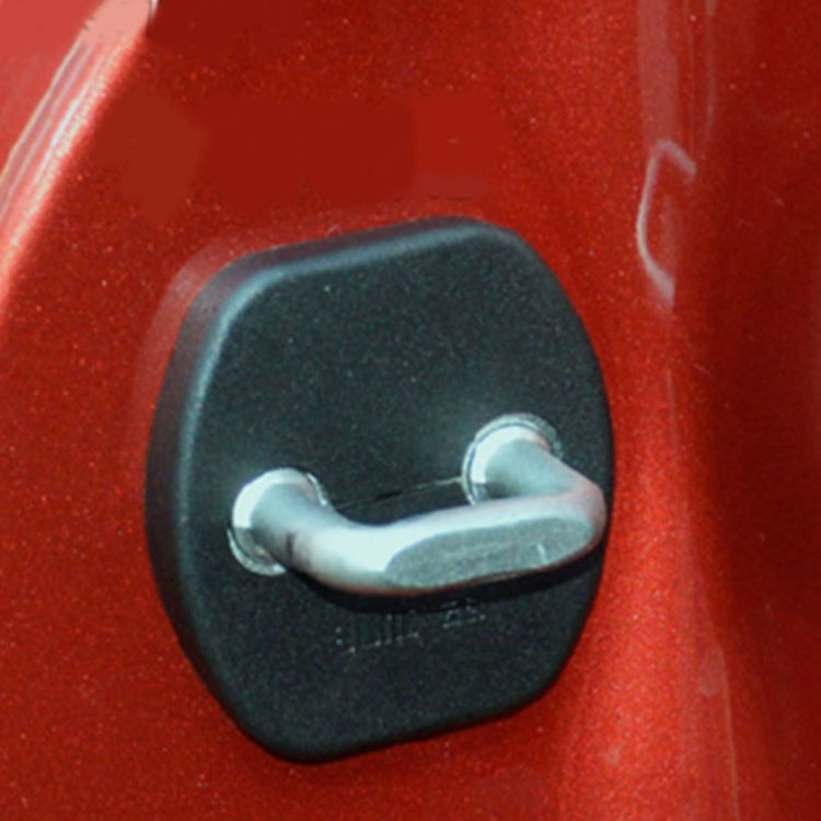 Installed black door lock protection cover on red car door lock area