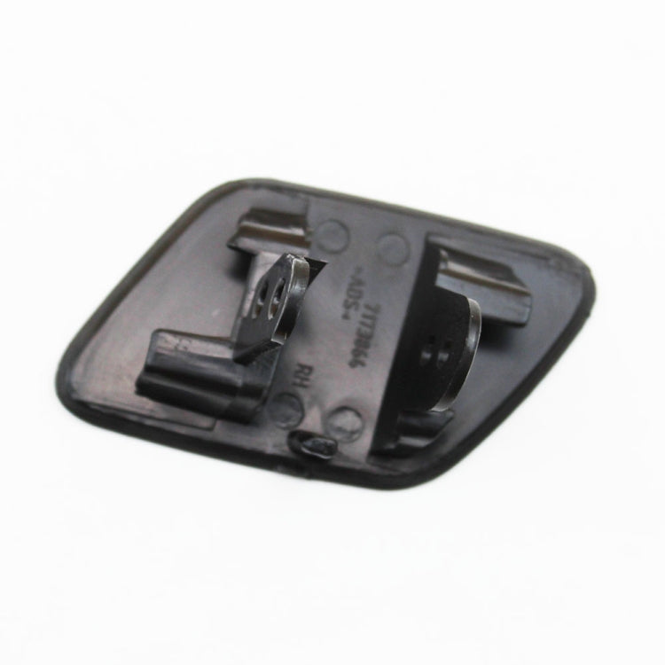 Washer jet cover backing plate with snap clips and nozzle opening
