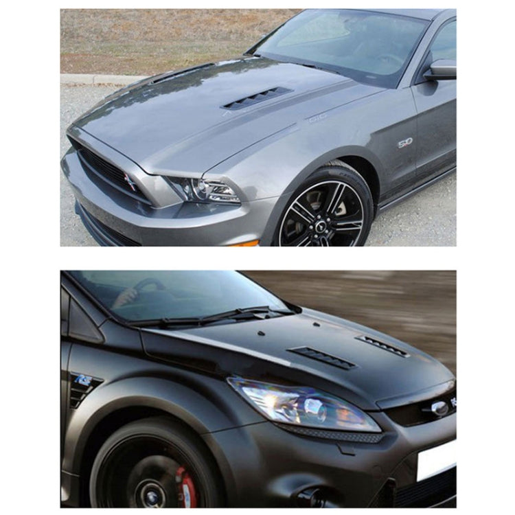 Black hood vent louver trim set on car hood with scooped vent openings