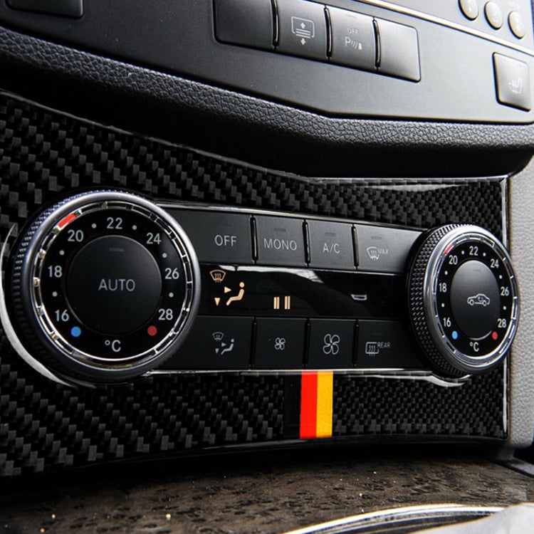 Carbon fiber air conditioning panel sticker with German flag stripe, oval cutout on dashboard