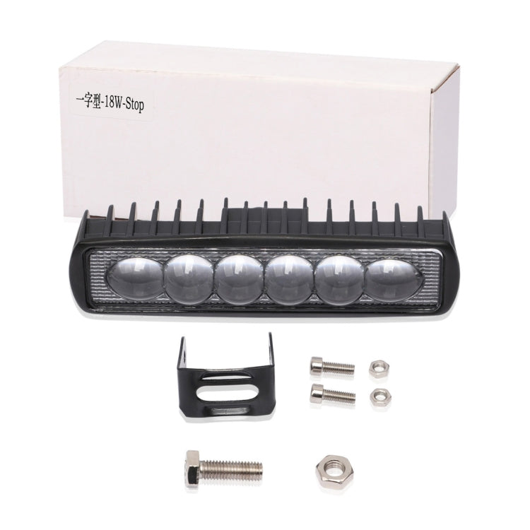 LED light bar kit with black housing, mounting bracket, bolts, and hardware pieces