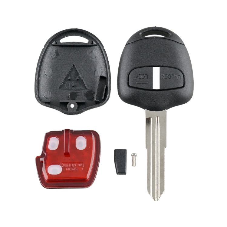 Mitsubishi key fob components: shell halves, metal blade, red battery cover, key insert