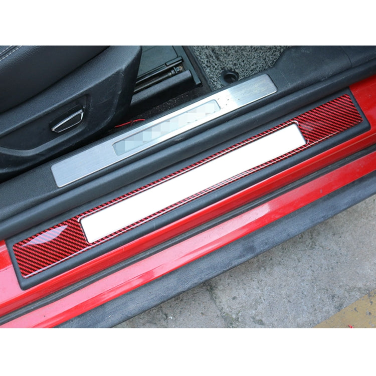 Installed welcome pedal outer frame sticker with red trim and carbon fiber texture