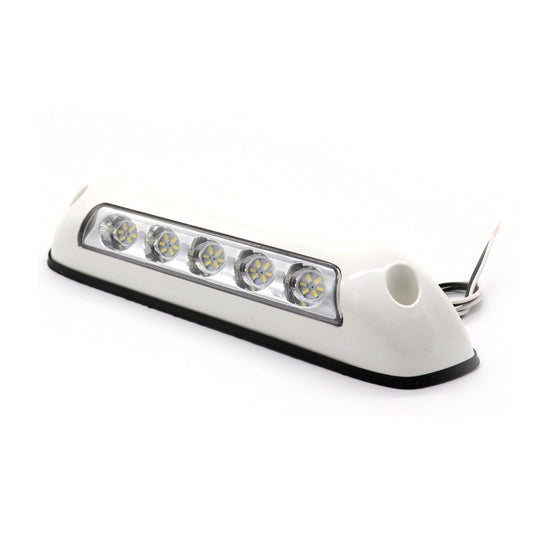 White LED deck dome stair light with rubber base and clear lens, side view.