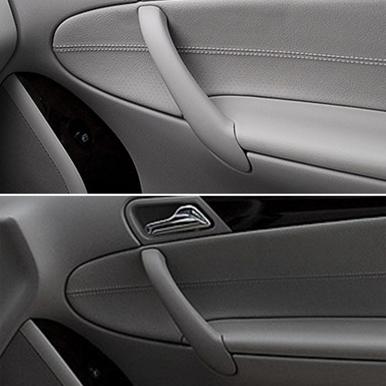 Light gray rear inside door handle pull trim cover installed on car door panel