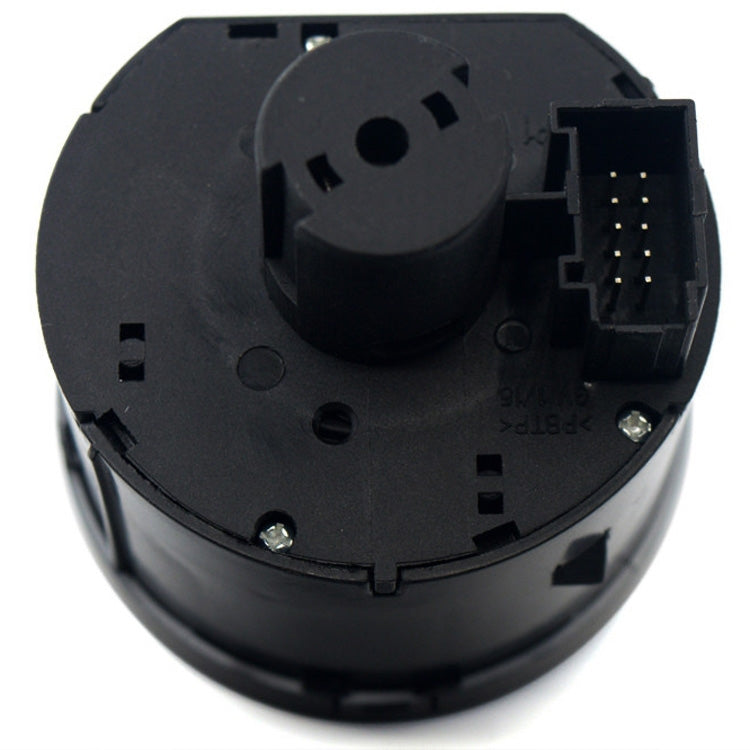 Black headlight switch knob back view with electrical connector pins