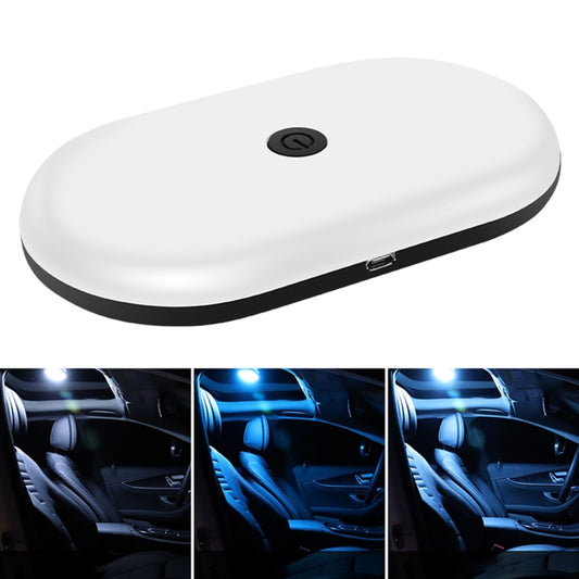 Oval dome reading lamp, white casing with black rim and side USB port.