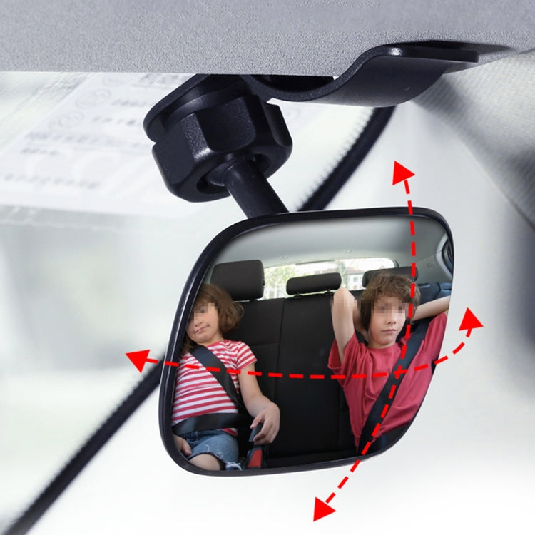 Installed blind spot mirror on car window for rear-seat visibility