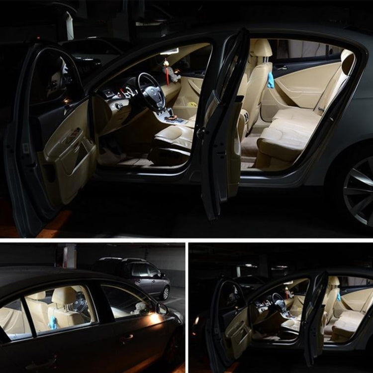 Car interior showing dome reading light glow with door open