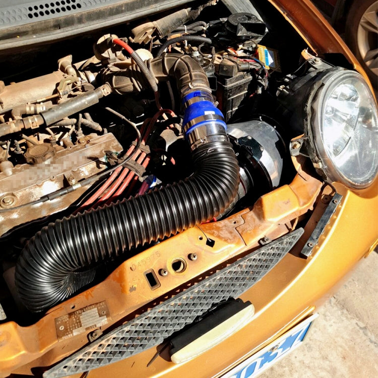 Black corrugated intake duct hose in engine bay near front headlight area