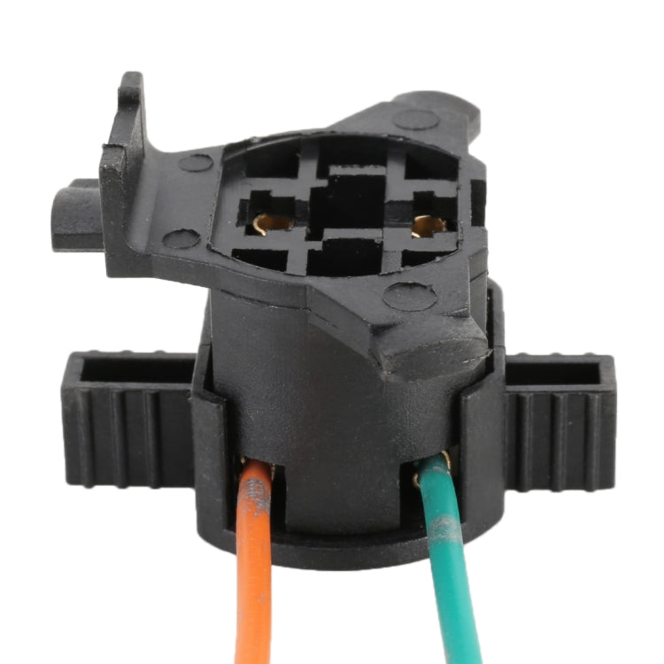 H7 lamp holder connector with two wire leads (orange and teal) in black plastic housing