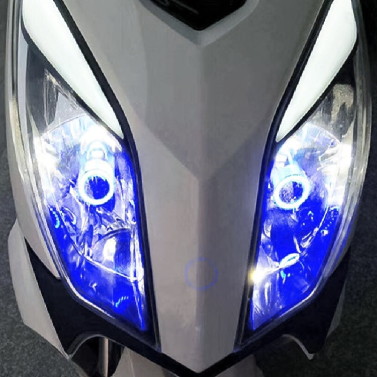 Motorcycle front headlight pair with blue angel eyes rings glowing