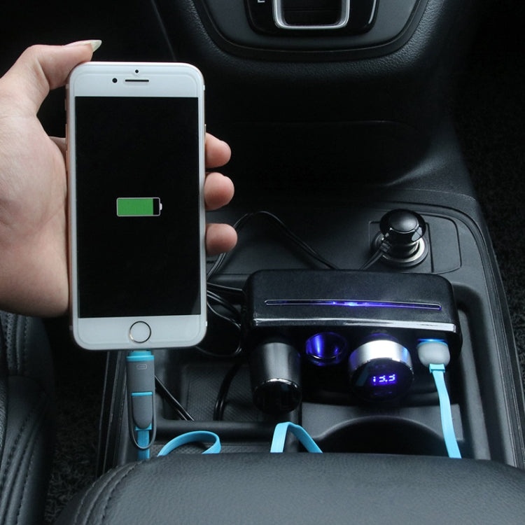 Black 3-in-1 car charger charging a phone with blue LED glow and dual USB ports