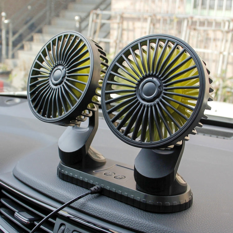 Dual-head car USB cooling fan mounted on dashboard with black base