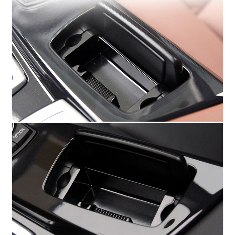Close-up of black ashtray insert tray with ridged base and inner slot