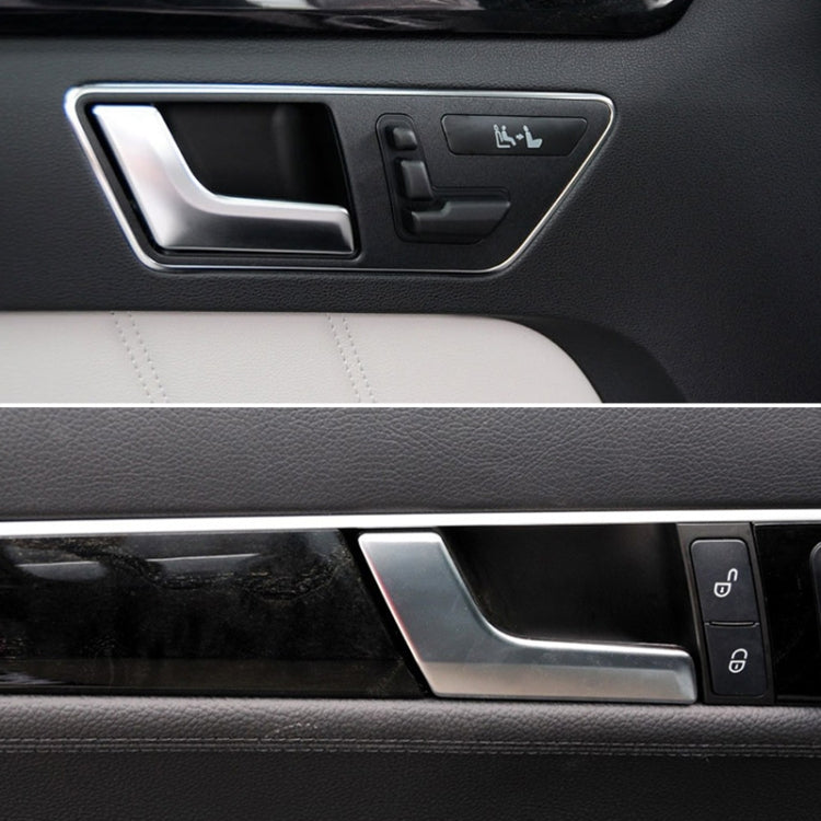 Matte inner door handle trim installed on car door panel, silver surround