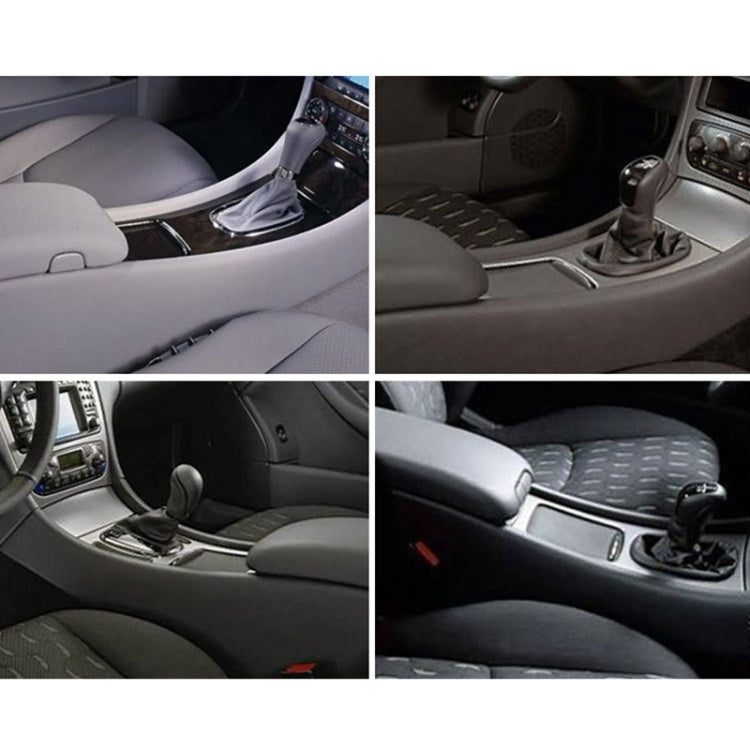 Installed black roller blind storage panel on car center console with cup holder area
