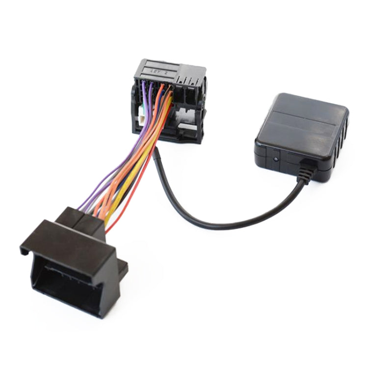 Car Bluetooth AUX audio adapter cable with two black modules and wiring plugs