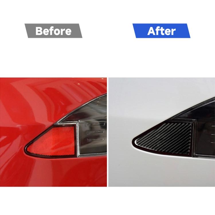 Charging port area with carbon fiber decorative sticker, black weave panel effect