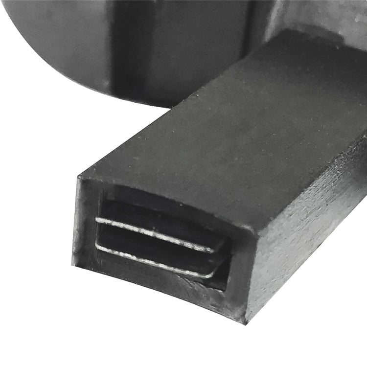 Left seat release handle close-up, black plastic rectangular latch slot