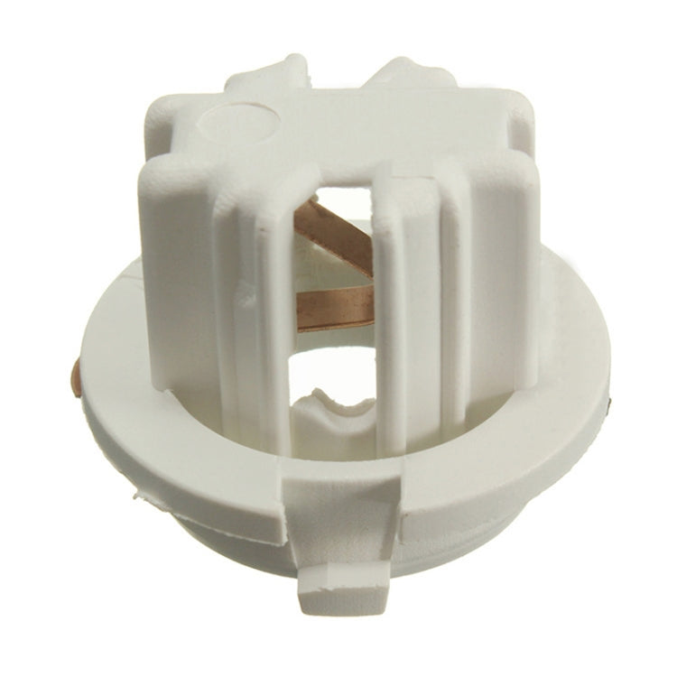 Bulb socket holder with white plastic body and visible copper contact plates