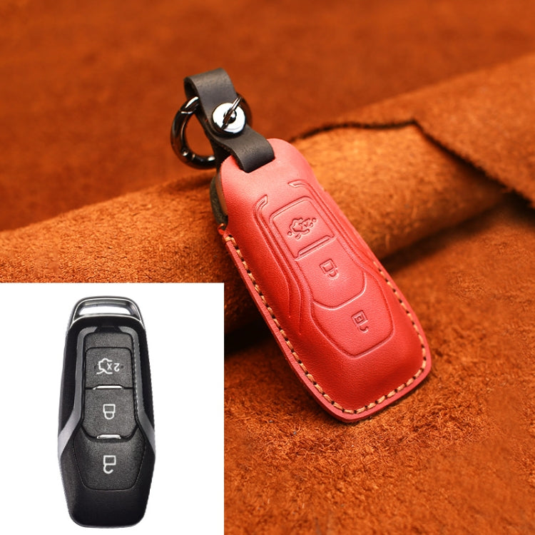 Red leather key fob cover with keyring and stitched edges, protective sleeve