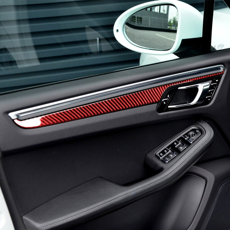 Installed red carbon-fiber style door panel trim sticker with white outline