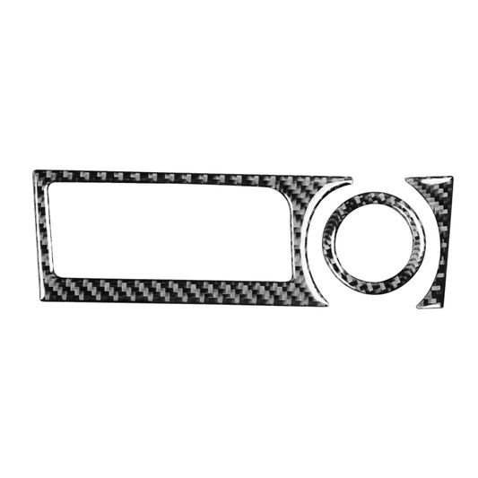 Carbon-fiber patterned storage console trim with rectangular insert and round ring