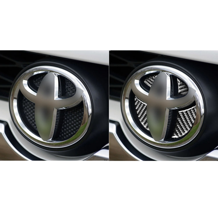 Carbon fiber-look grille logo stickers on Toyota badge, two close-up views