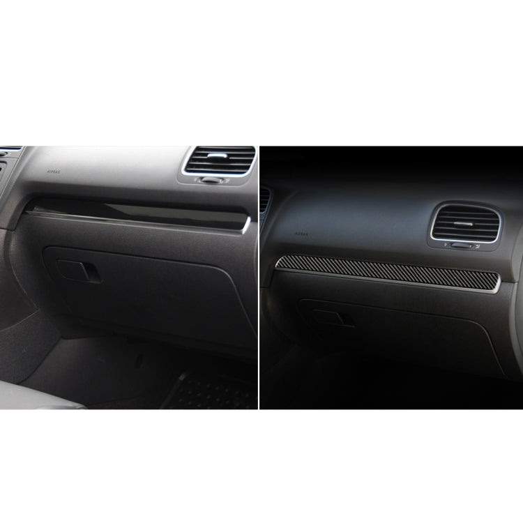 Carbon fiber dashboard trim strip installed under the center air vent