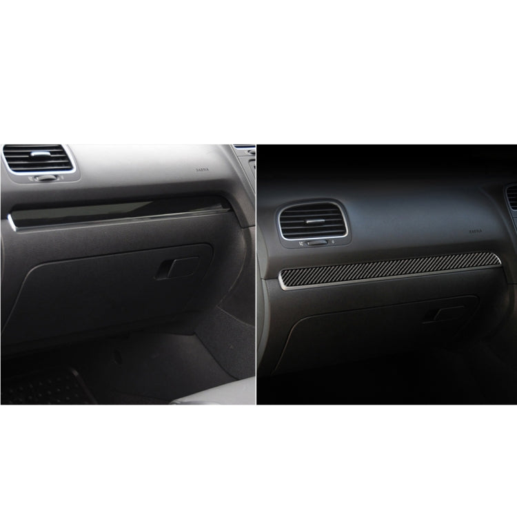 Dashboard center trim with carbon fiber-texture strip near air vent, black gray weave