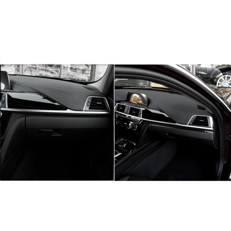 Dashboard center trim with and without carbon fiber decorative sticker strip