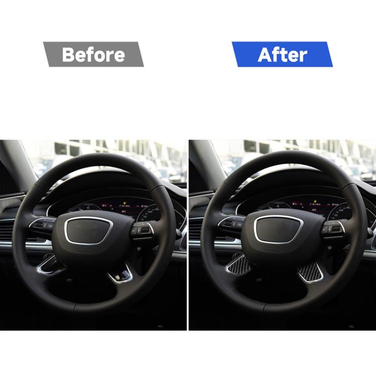 Steering wheel with applied black carbon-fiber button trim accents on controls