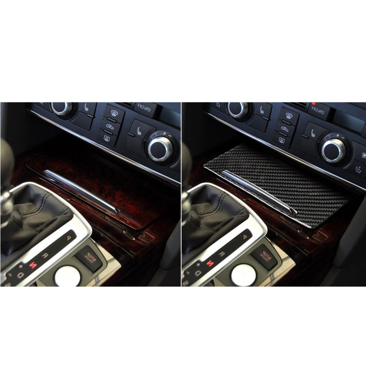 Installed black carbon fiber storage cover sticker on car console for right-drive model.