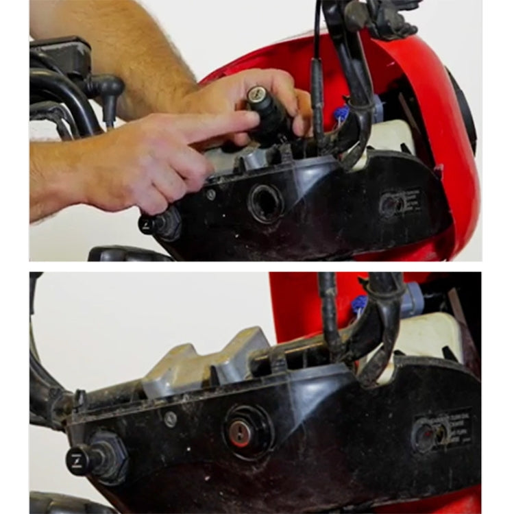 Hand holding an ignition key switch on a motorcycle dash