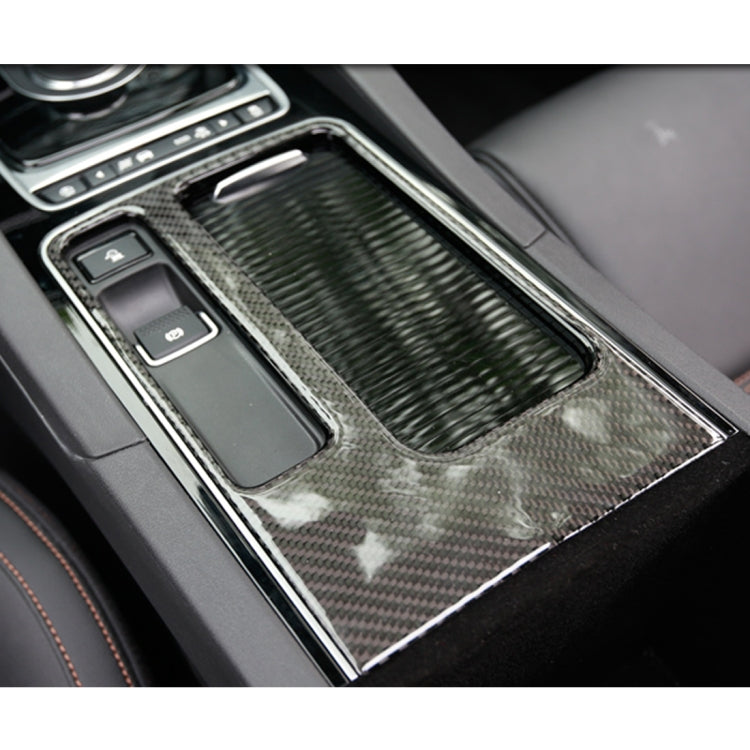 Carbon fiber style water cup sticker installed on car center console panel