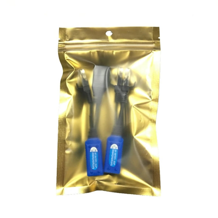 Gold plastic pouch containing two blue passive POE twisted transceivers