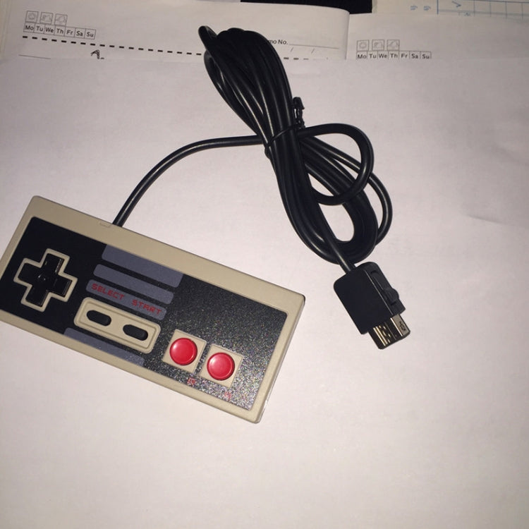 Extension cable adapter connected to a retro game controller, with black cord
