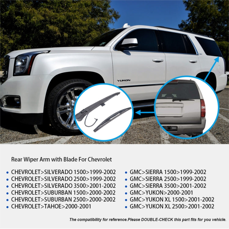 Rear wiper arm with blade mounted on SUV, black and dark gray