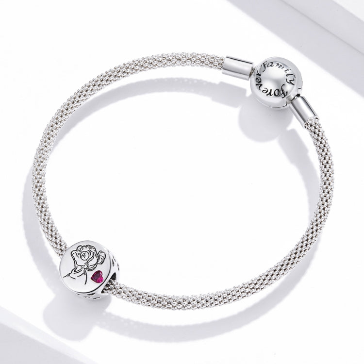 Silver chain bracelet with two engraved charm beads and pink heart stone accents