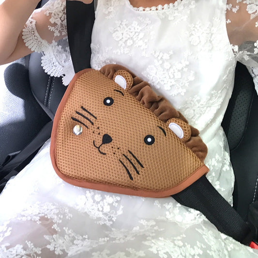 Brown lion-faced seat belt shoulder cover with whiskers and small button eyes