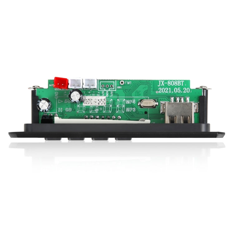 Car audio MP3 decoder PCB top view with USB connector, capacitors, and FM label